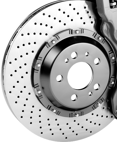 A close up of a brake disc with holes in it | 