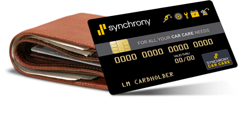 A credit card is sitting next to a wallet filled with money. | 19th Avenue Garage