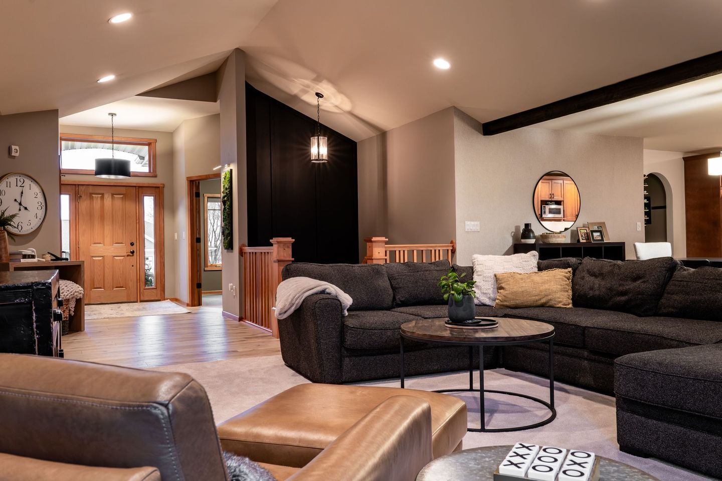 A living room filled with furniture and a couch.