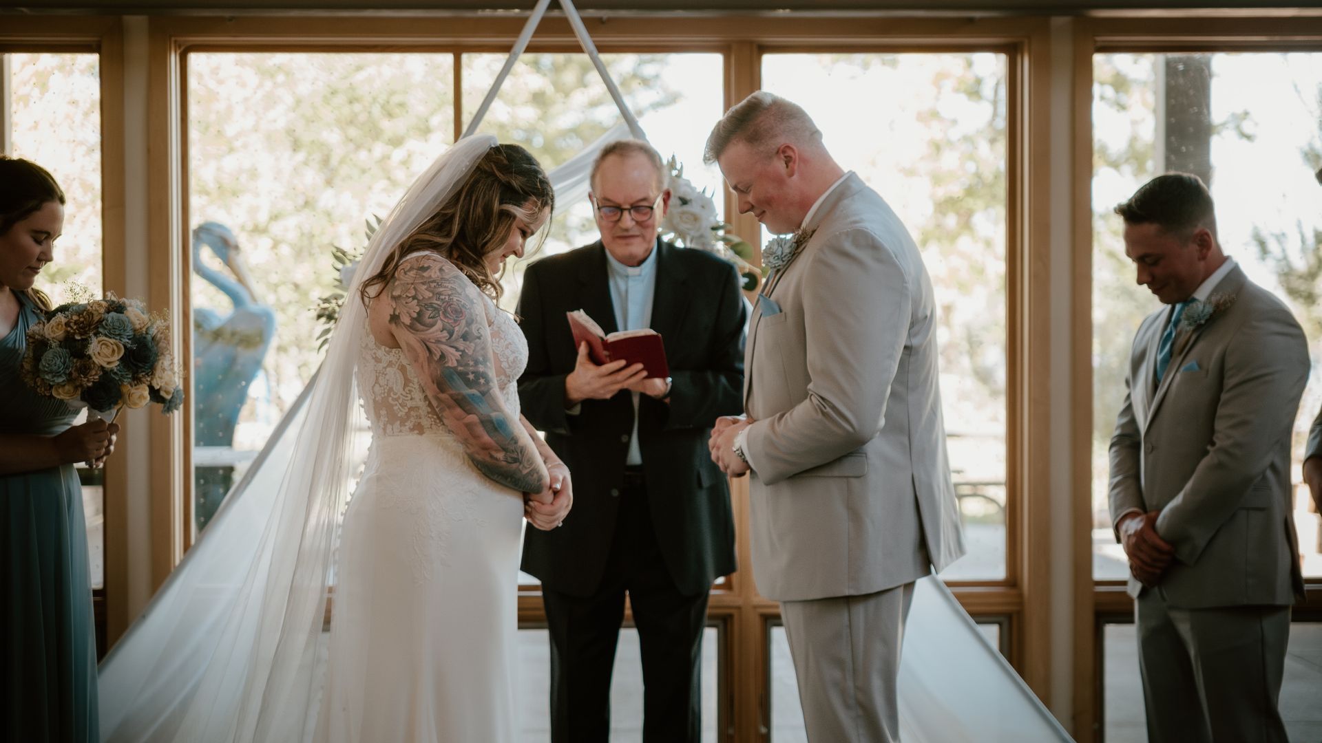 A bride and groom are getting married in a church.