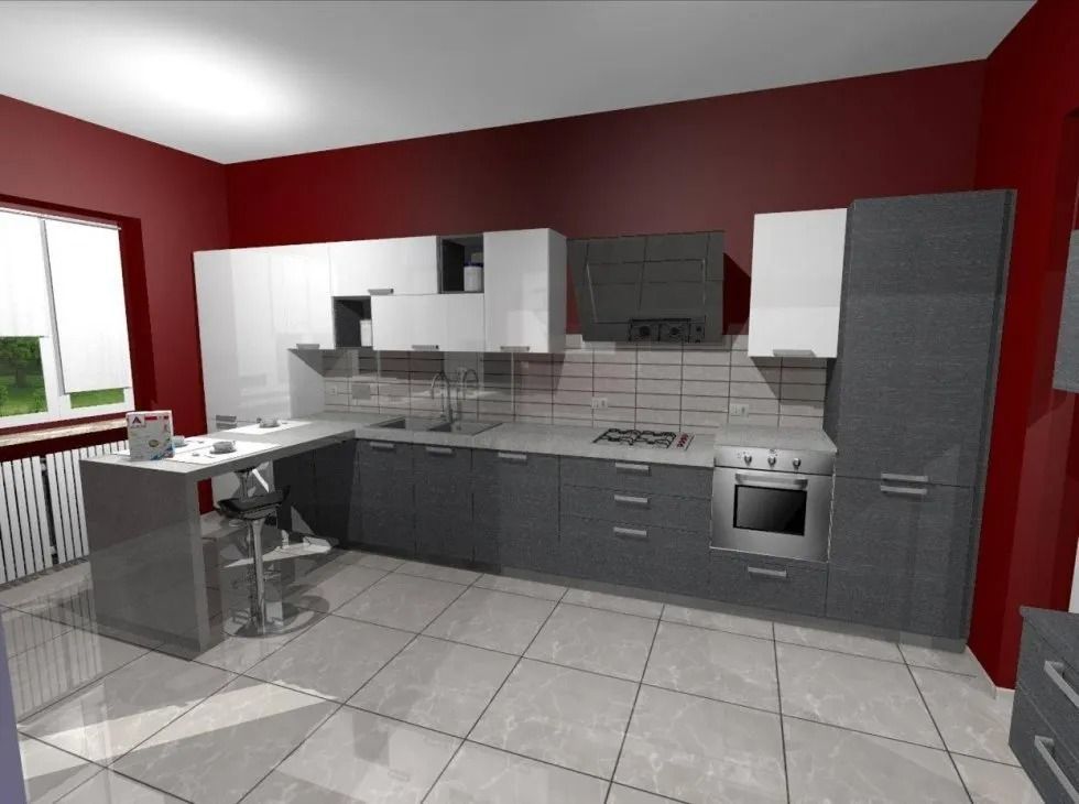 Cucina moderna con mobili grigi e bianchi, pareti rosse e una finestra.