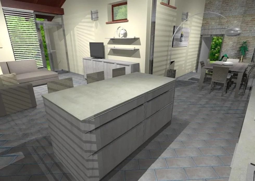 Interno di una cucina moderna con una grande isola, mobili grigi e una zona soggiorno visibile sullo sfondo.