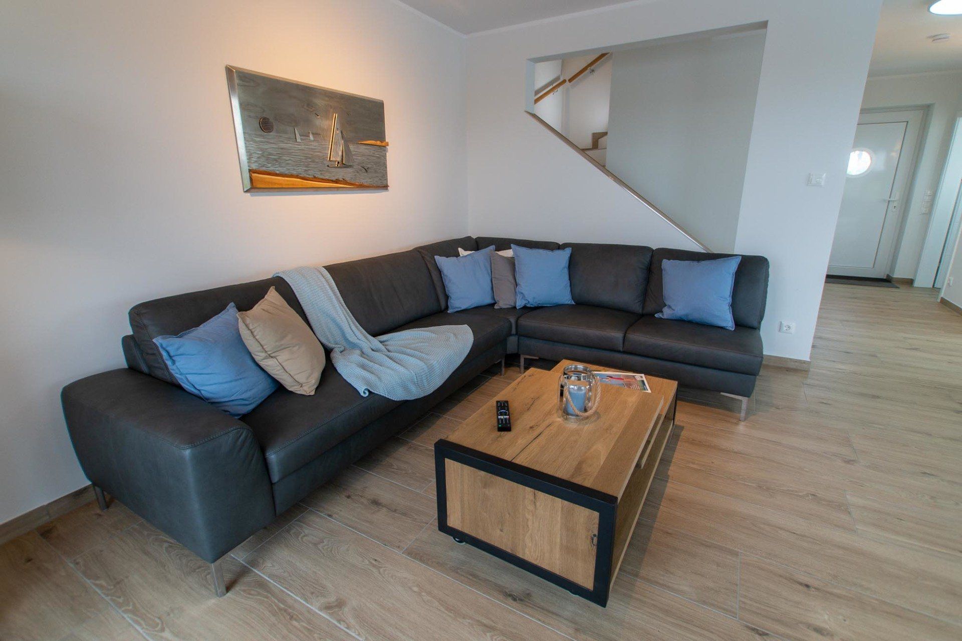 Wohnzimmer für gemütliche Abende mit Blick aufs Wasser  - Ferienhaus Seeperle Harlesiel