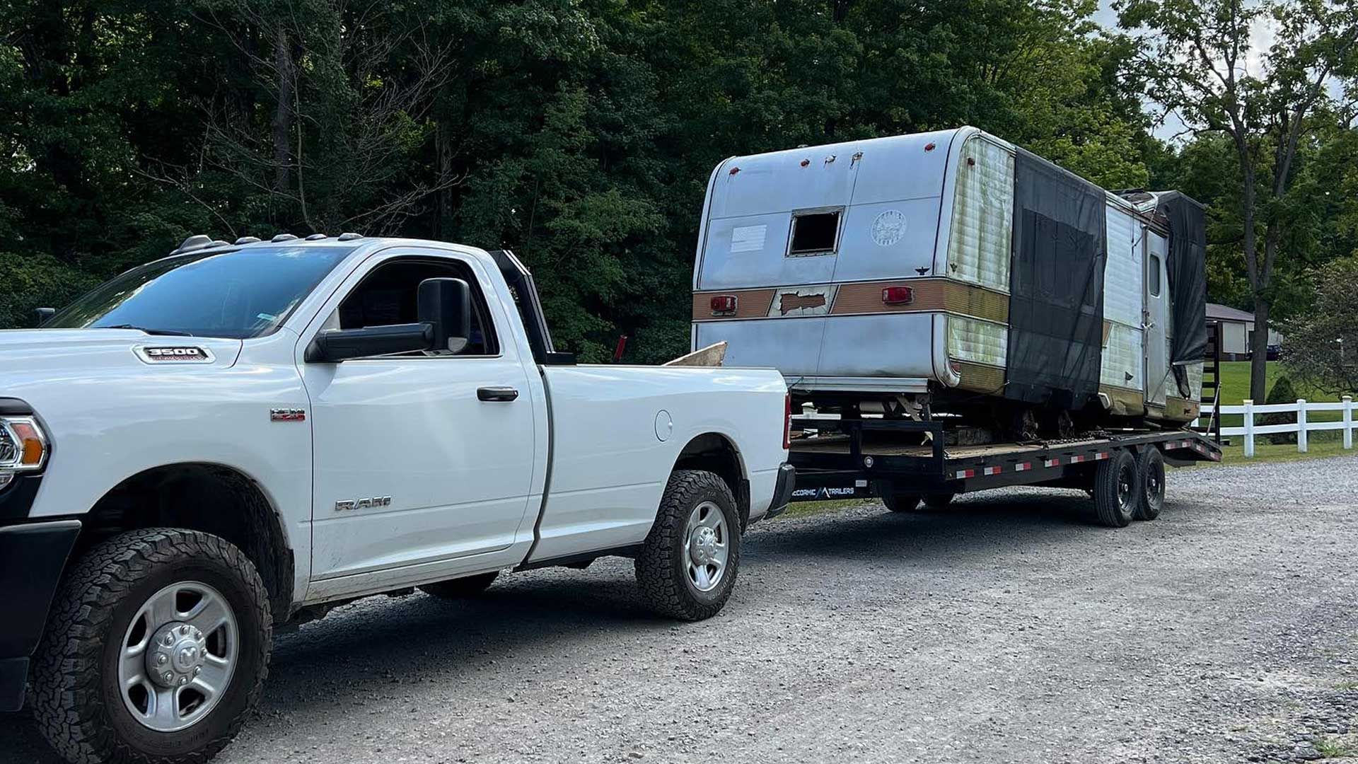 camper strapped to trailer, camper removal services in central oh