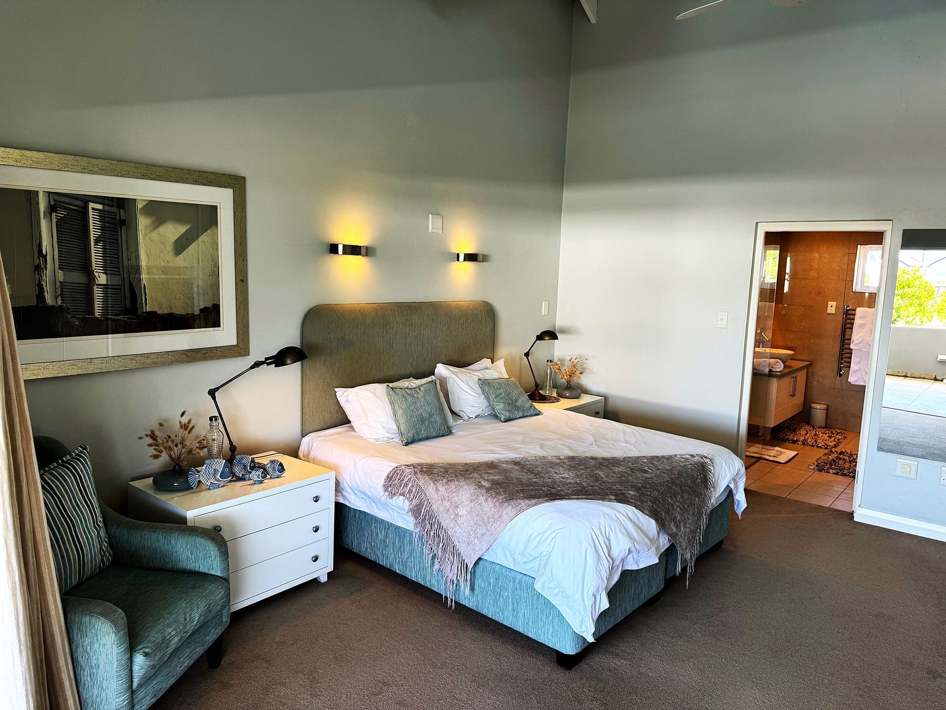 There is a large bed in the middle of the room.