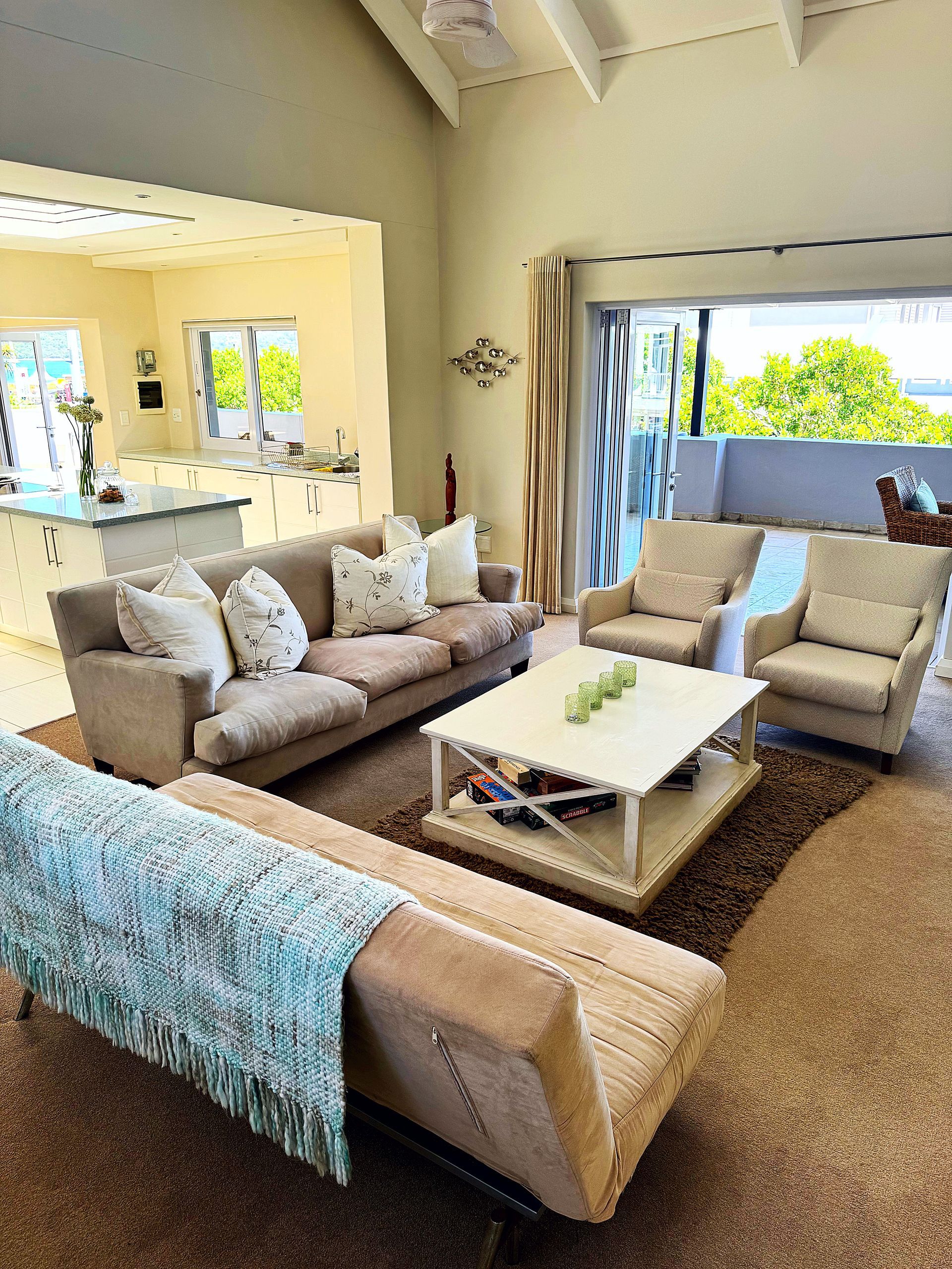 A living room filled with furniture and a coffee table.
