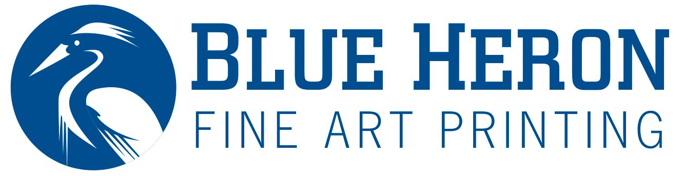 A blue heron fine art printing logo with a bird on it
