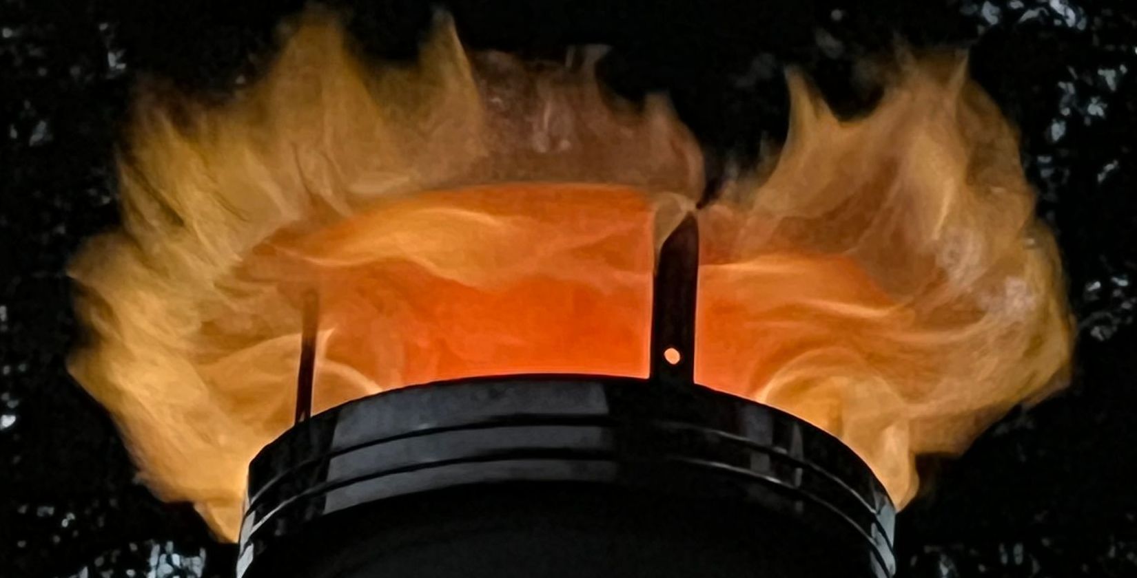Fire from the top of the production kiln chimney at 2350 degrees F