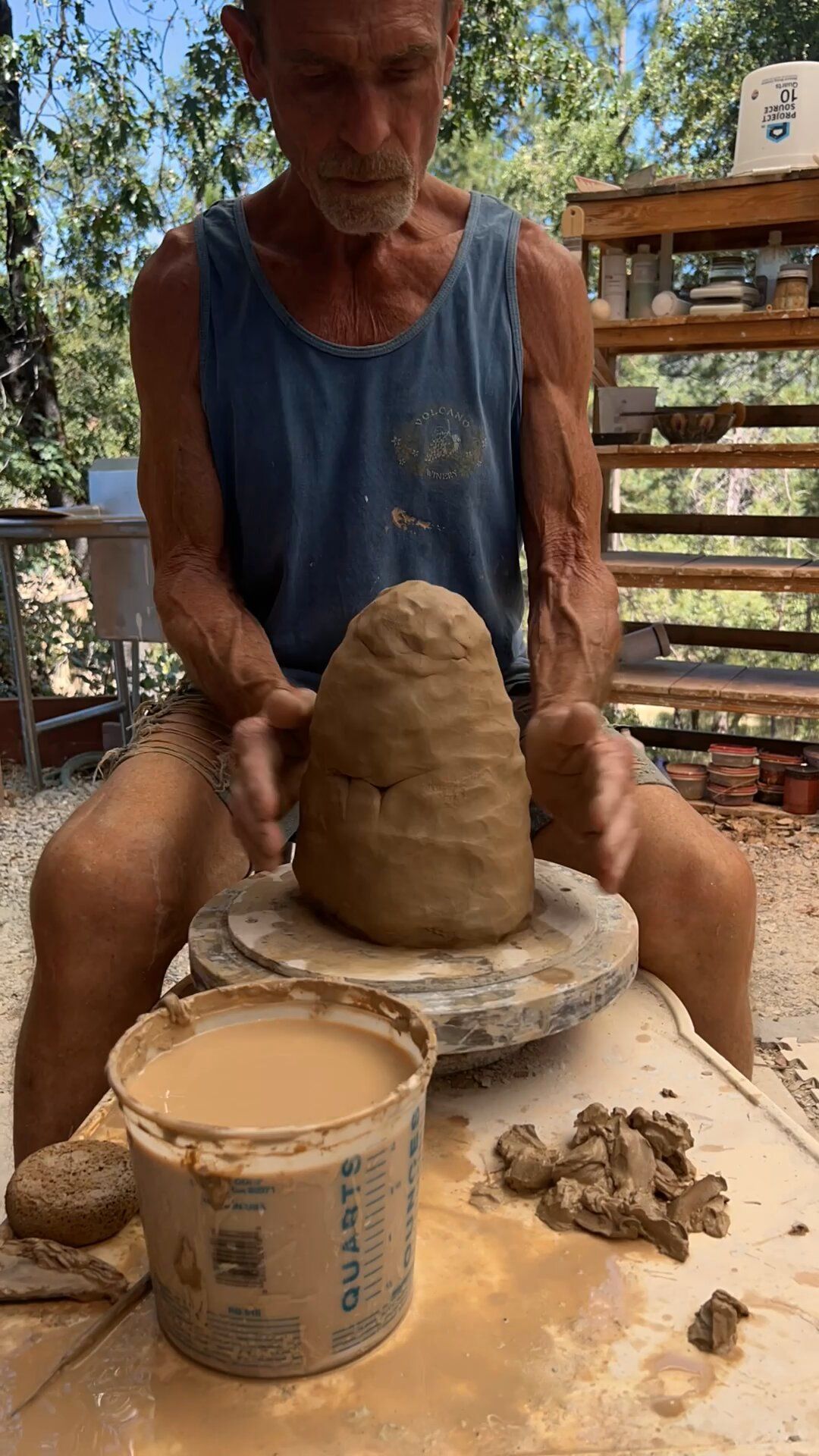 Reading the clay  for centering of the 20 pound half's of the rain catchers