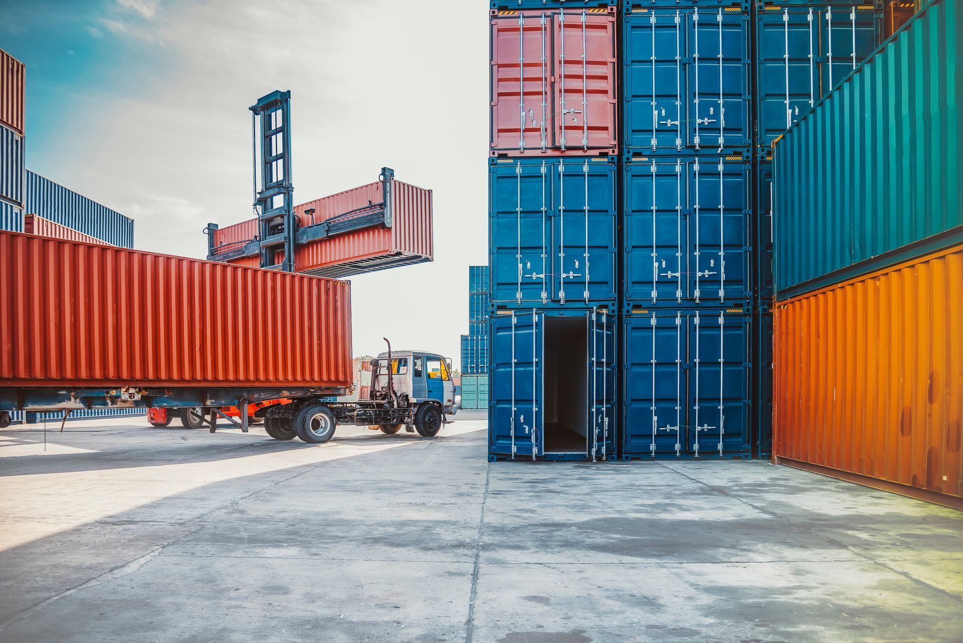 a forklift lifts an on-site storage container