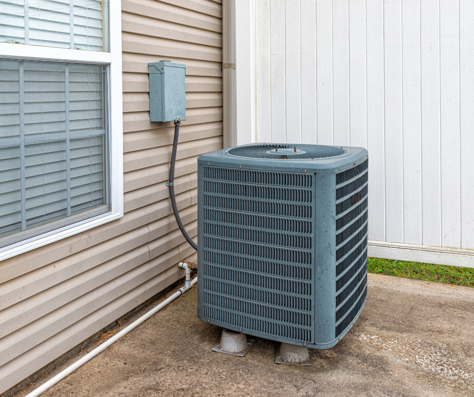 A water heater is connected to a water tank in a basement.