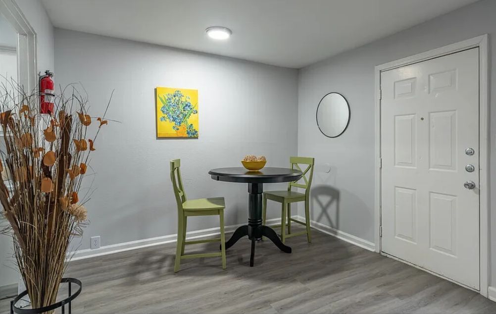 Photo of the dining room area, close to the front door