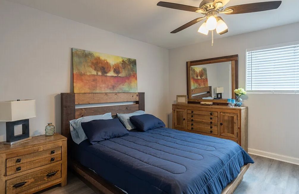 Photo of a bedroom, with a large bed and plenty of walking space