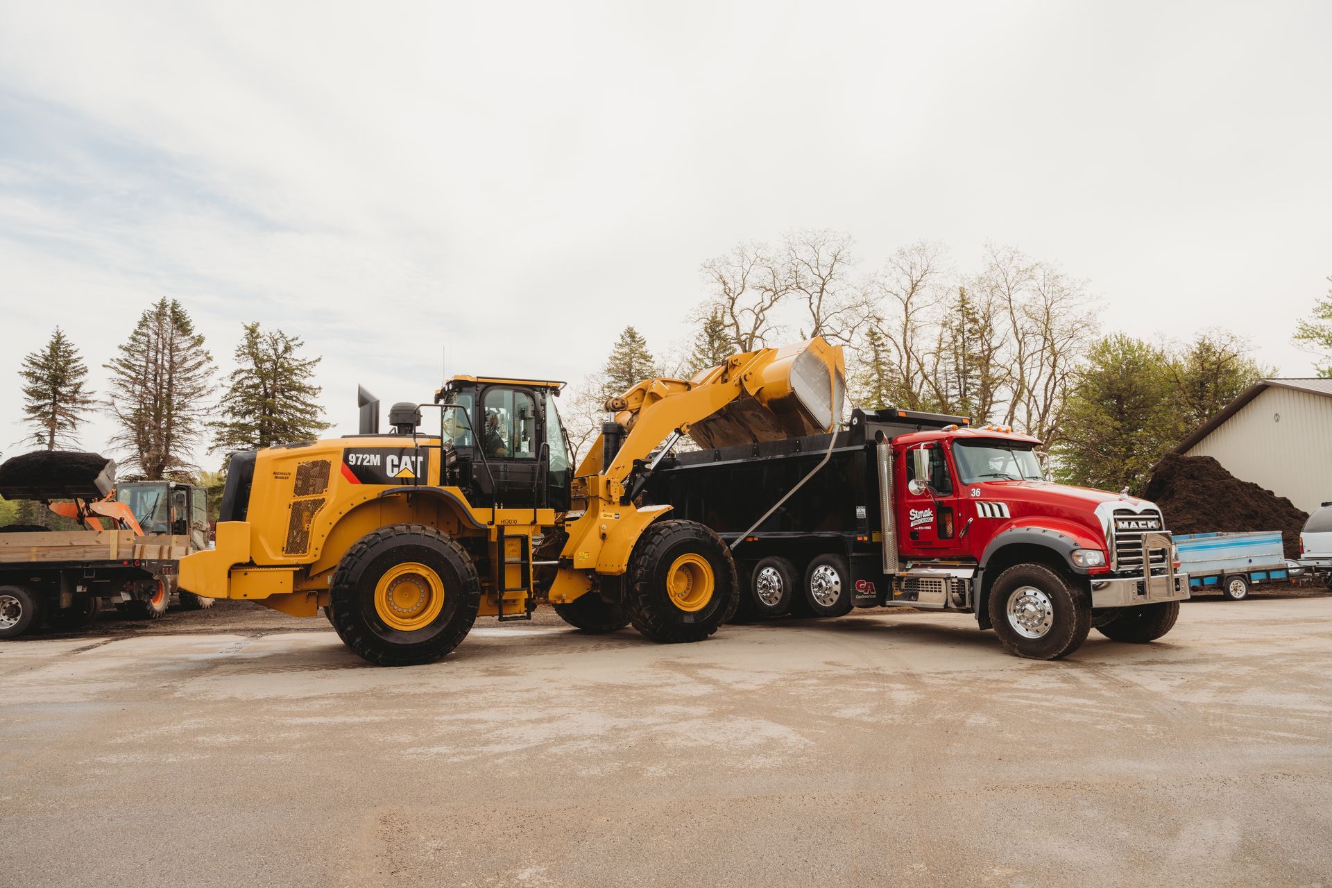 Dump truck unloading sand — North Kingsville, OH — Simak Trucking & Excavating, Inc. Dump truck unloading sand — North Kingsville, OH — Simak Trucking & Excavating, Inc.