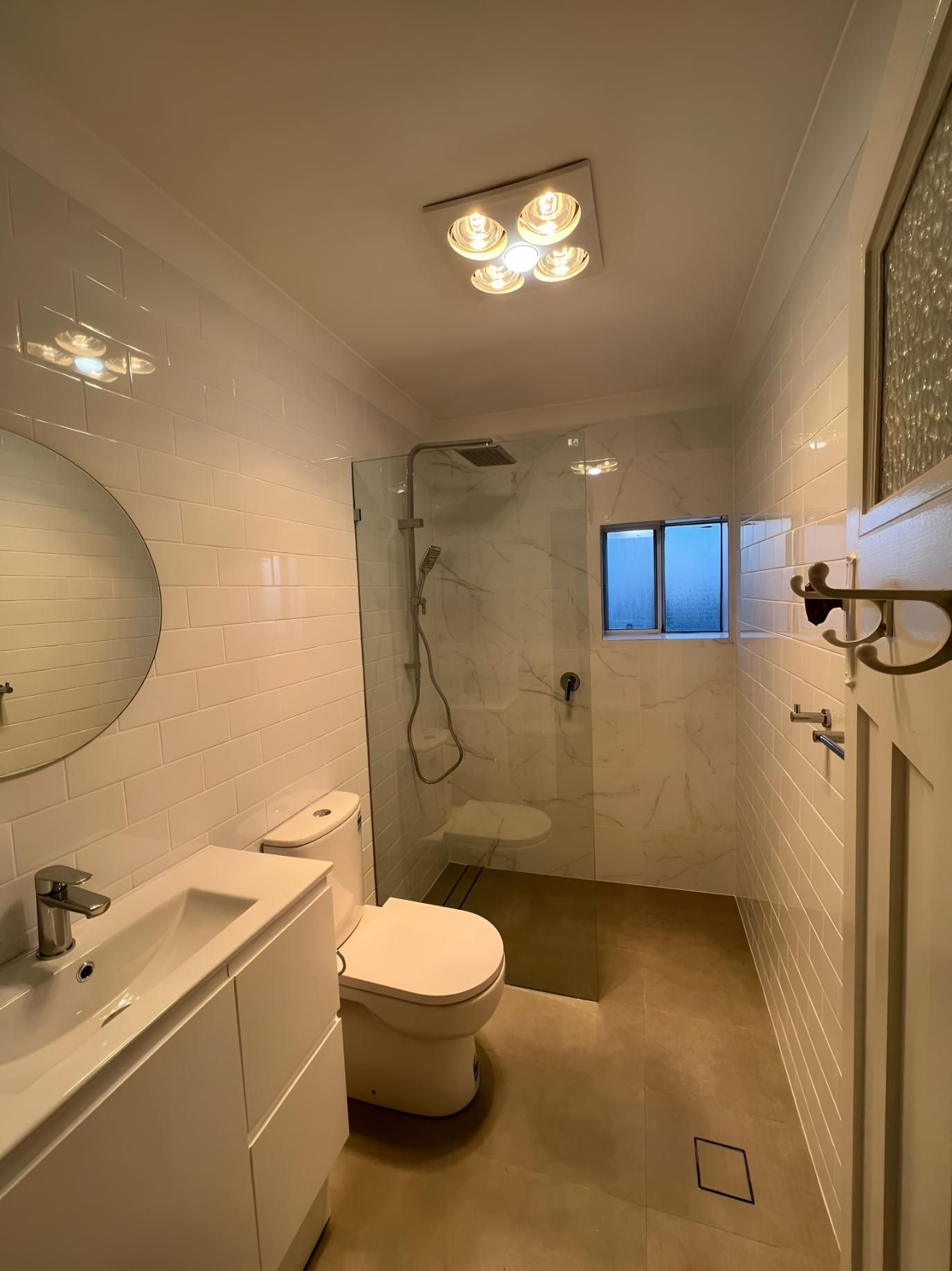 Modern White Bathroom With a Shower — LD Carpentry in Queanbeyan, NSW