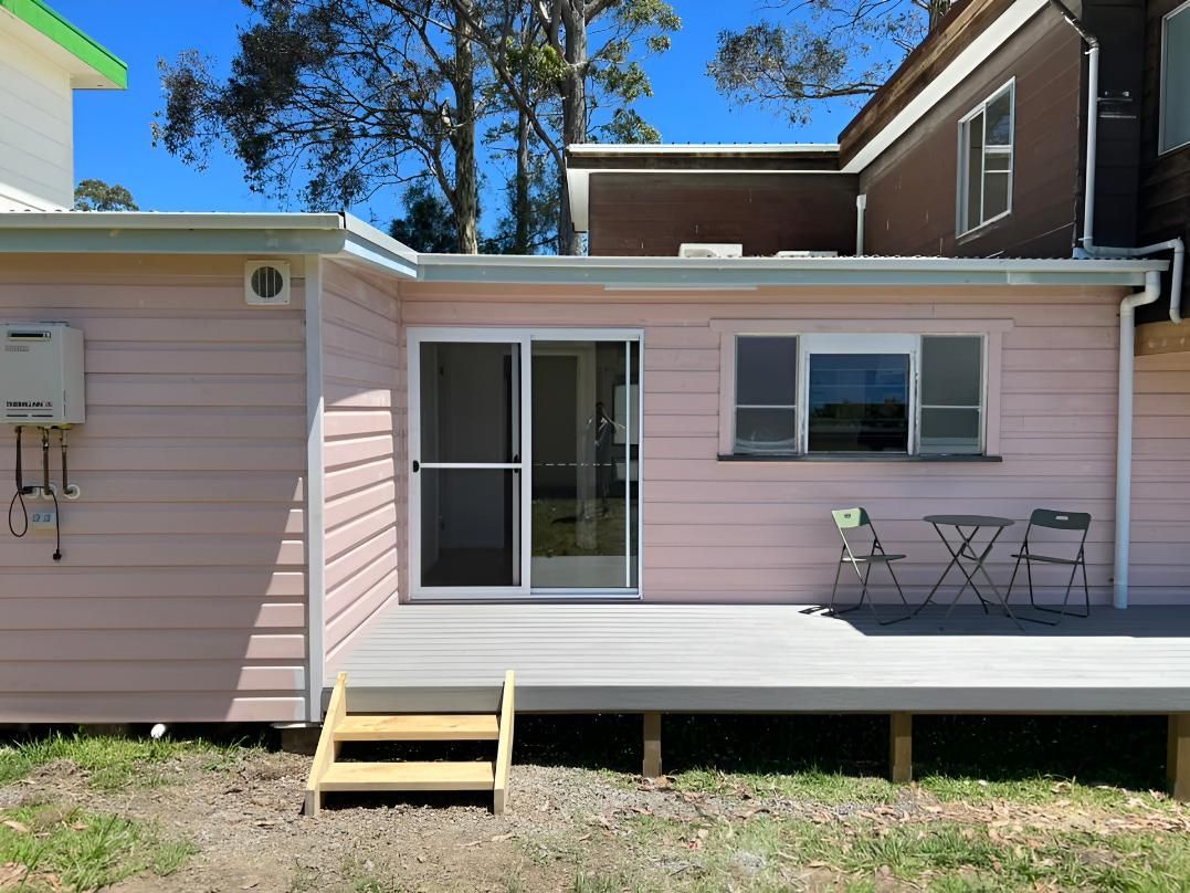 Pink House With a Deck, Sliding Door — LD Carpentry in Queanbeyan, NSW