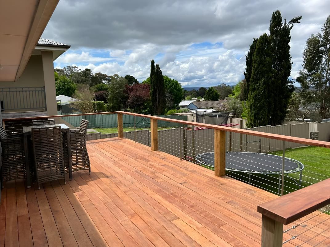 Wooden Deck With Furniture — LD Carpentry in Bowral, NSW