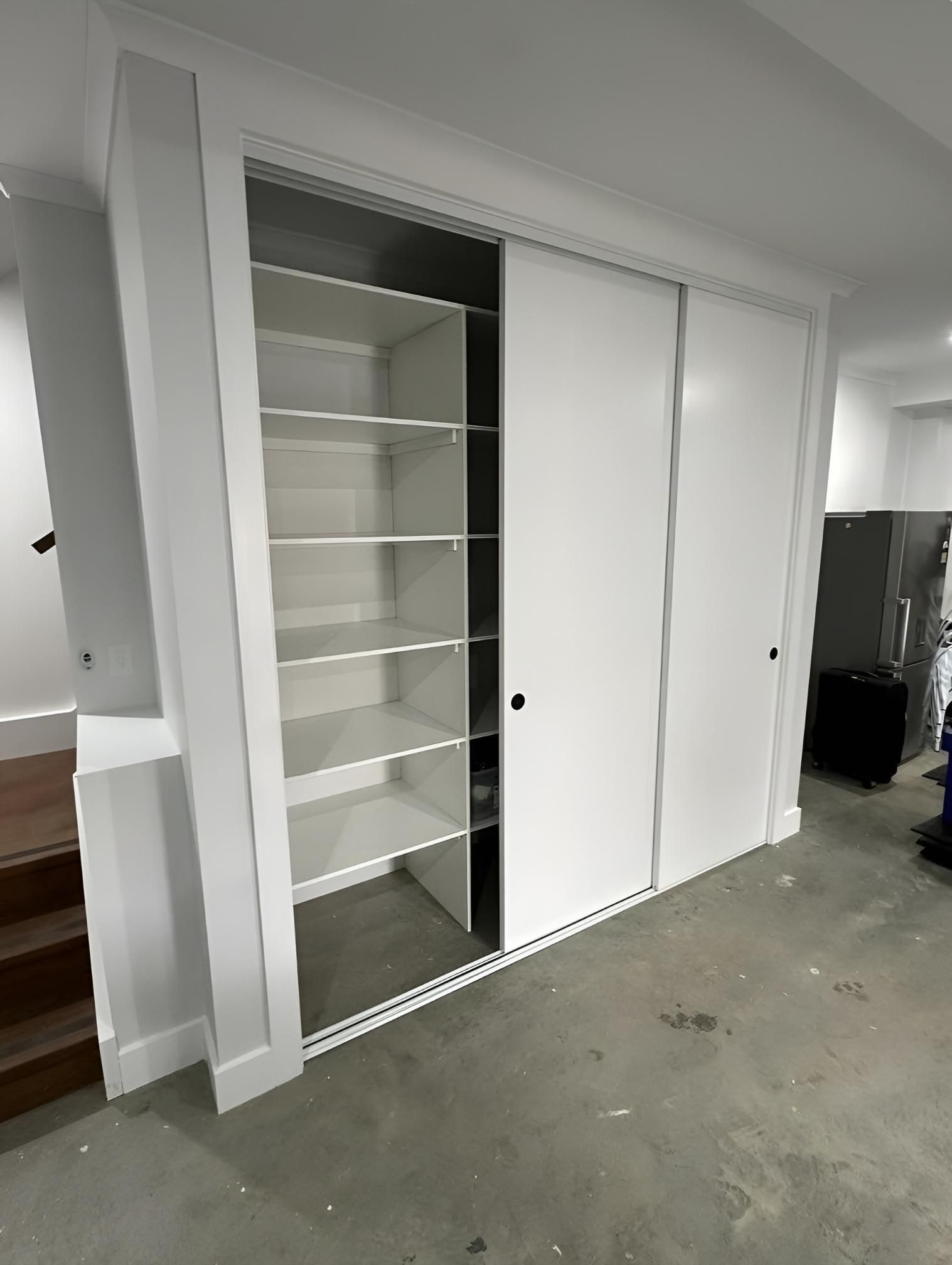 White Cabinet With Sliding Doors — LD Carpentry in Canberra, ACT