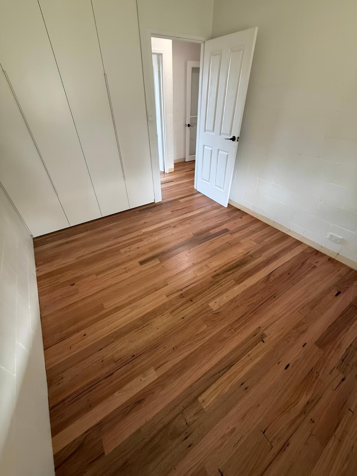 Empty Room With Hardwood Floors — LD Carpentry in Goulburn, NSW
