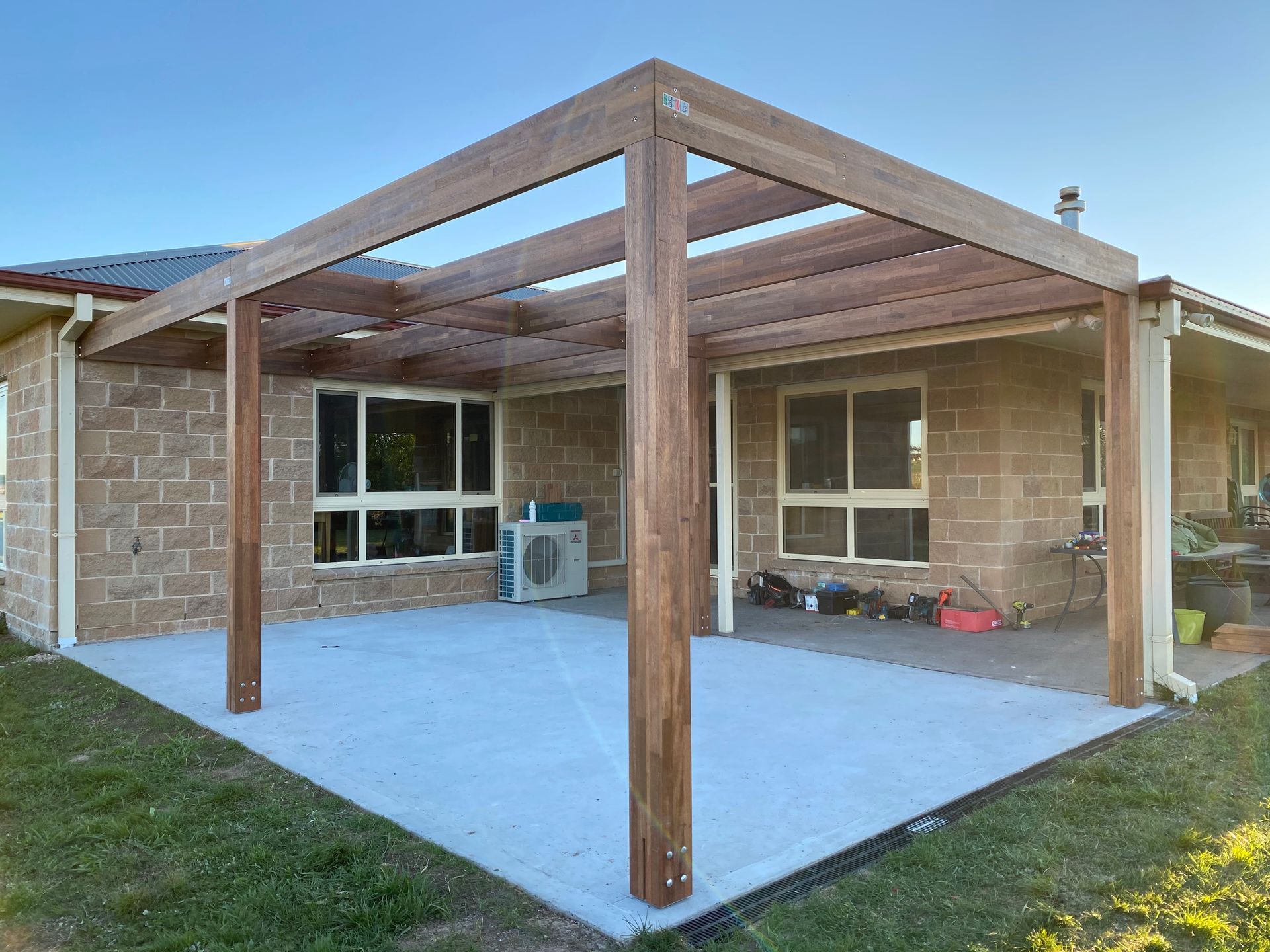 House With a Wooden Pergola — LD Carpentry in Goulburn, NSW