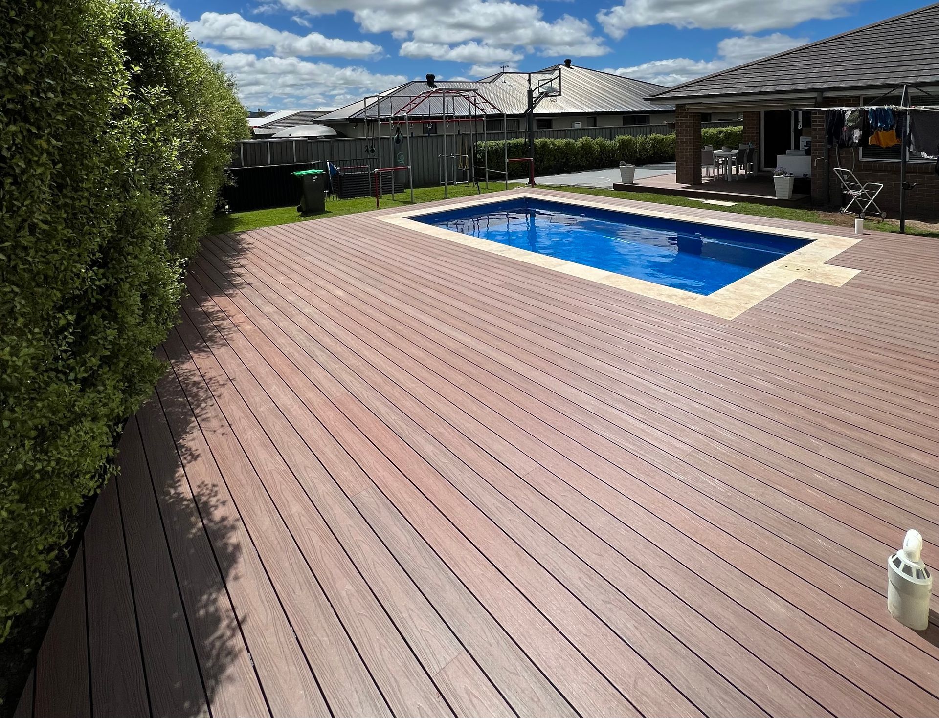 Wooden deck surrounding a pool — LD Carpentry in Goulburn, NSW