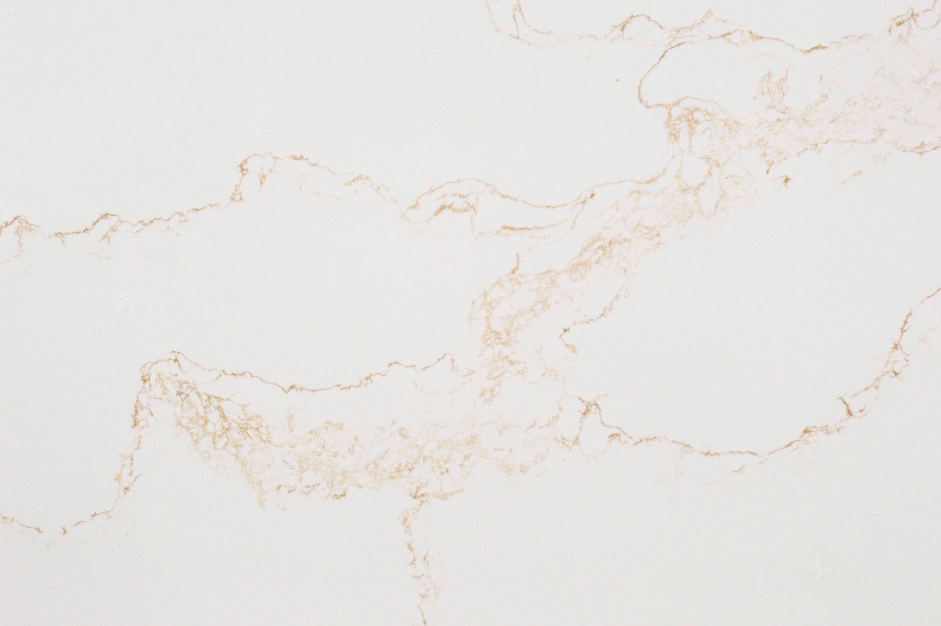 White marble surface with faint gold veining on a light background