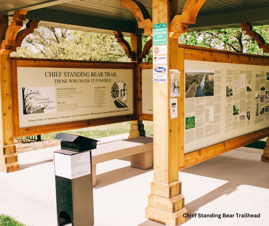 A sign that says chief standing bear trail on it