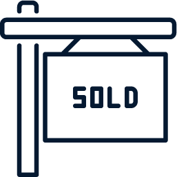 A sold sign is hanging from a pole.