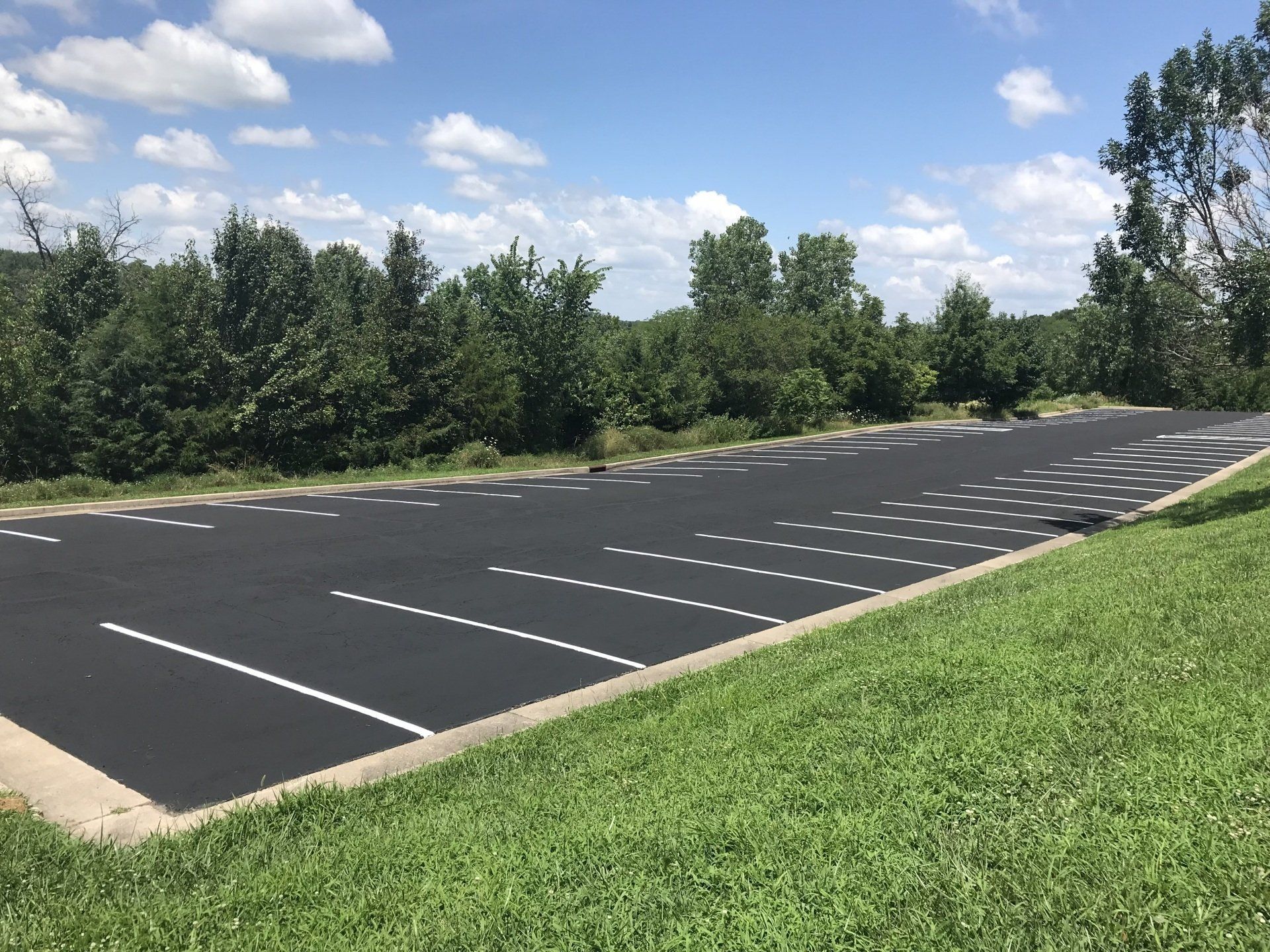 MoSEAL Paves, Seals & Stripes Asphalt in Fayette, MO. Call for a Free Quote.