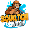 Cartoon Bigfoot washing a window with orange “SQUATCH WASH” logo and blue splash background