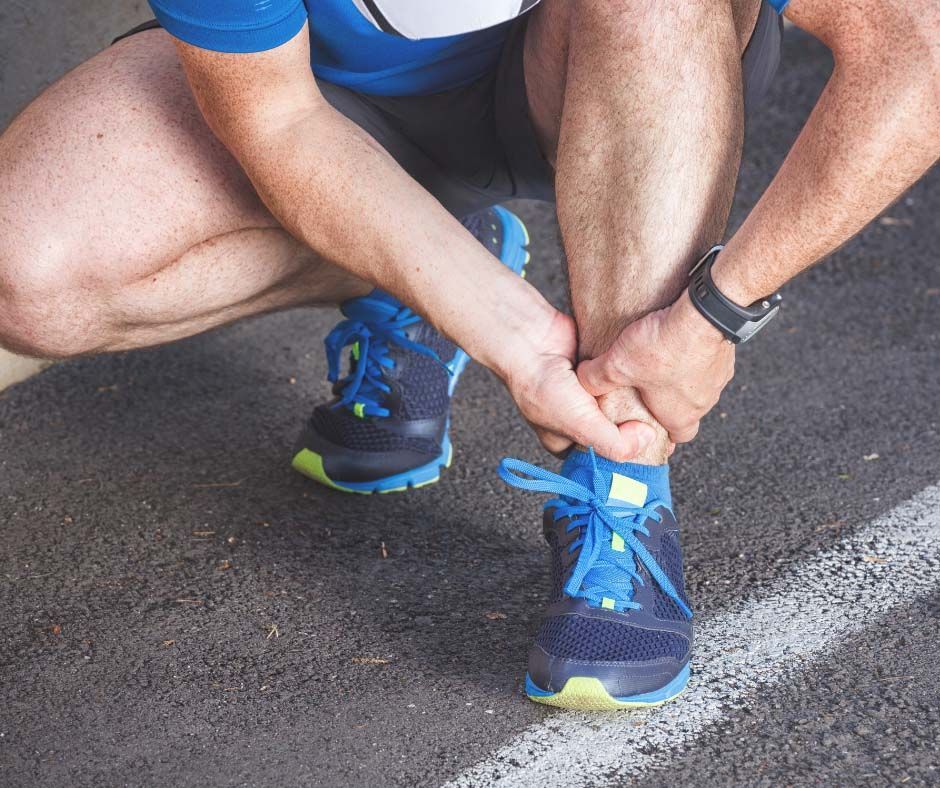 Man feeling ankle pain - Your Sports Physio in Bundaberg, QLD