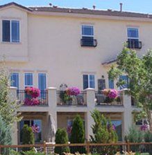 Residential Painting — Mapple House With Flowers In Gate in Sparks, NV