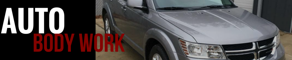 A grey Dodge Journey with text