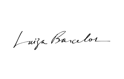 Um close da assinatura de uma pessoa em um fundo branco.