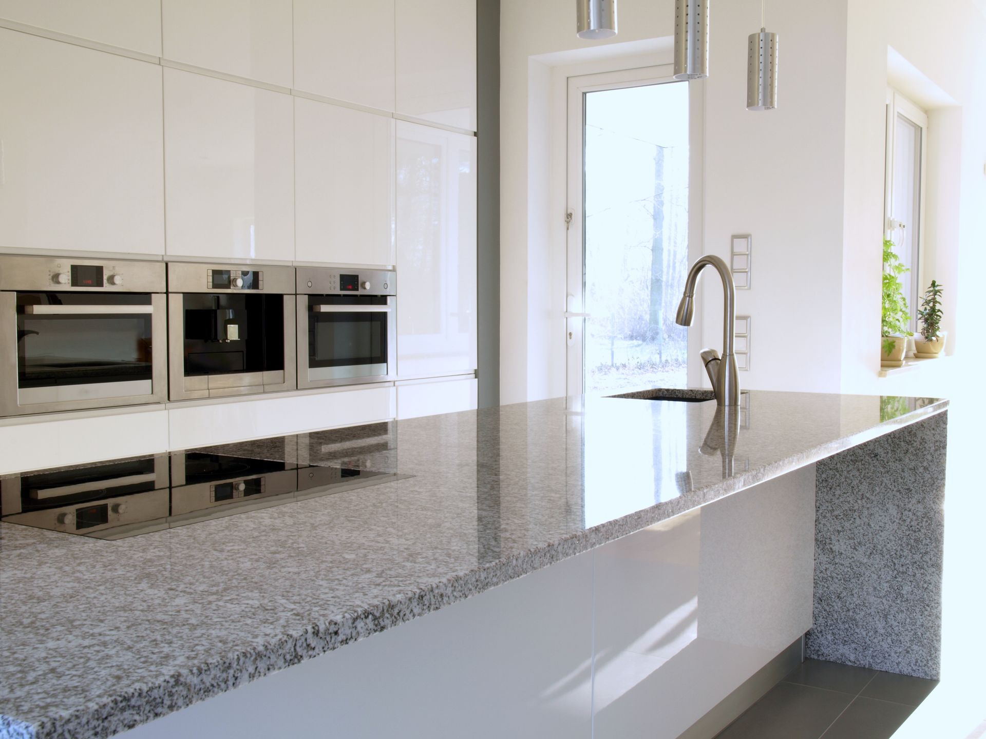 A granite countertop in a kitchen. A granite countertop in a kitchen.