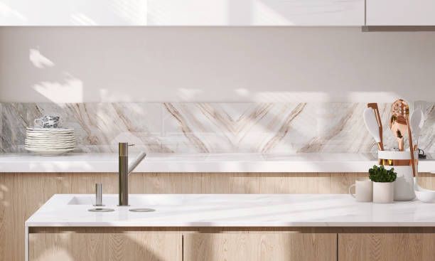 Modern kitchen featuring quartz kitchen countertops, a wooden island, and a sleek white quartz sink.