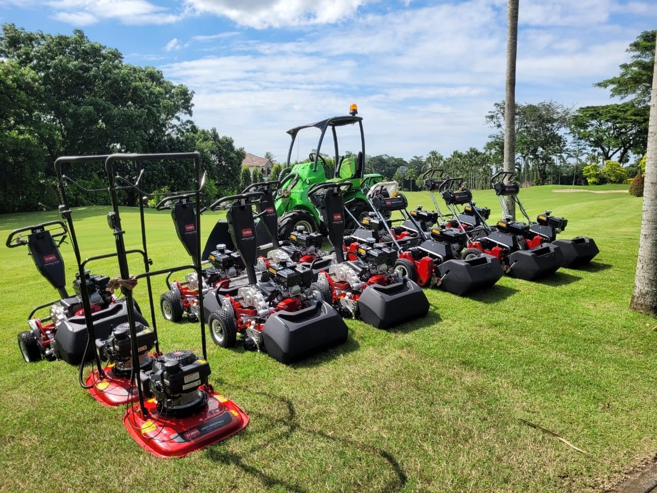 Fleet of turf maintenance equipment staged and ready, reflecting advanced tracking and scheduling in turf tech.