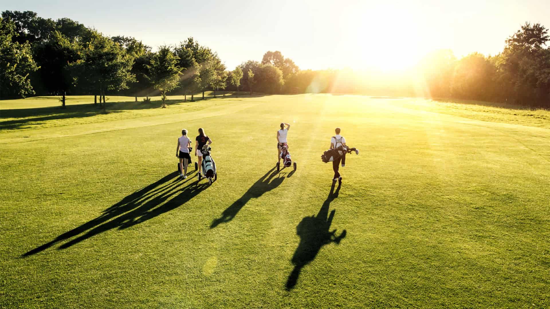 Group of golfers walking the fairway, reflecting how Fairway Control ensures better spacing and a smoother on-course experience.