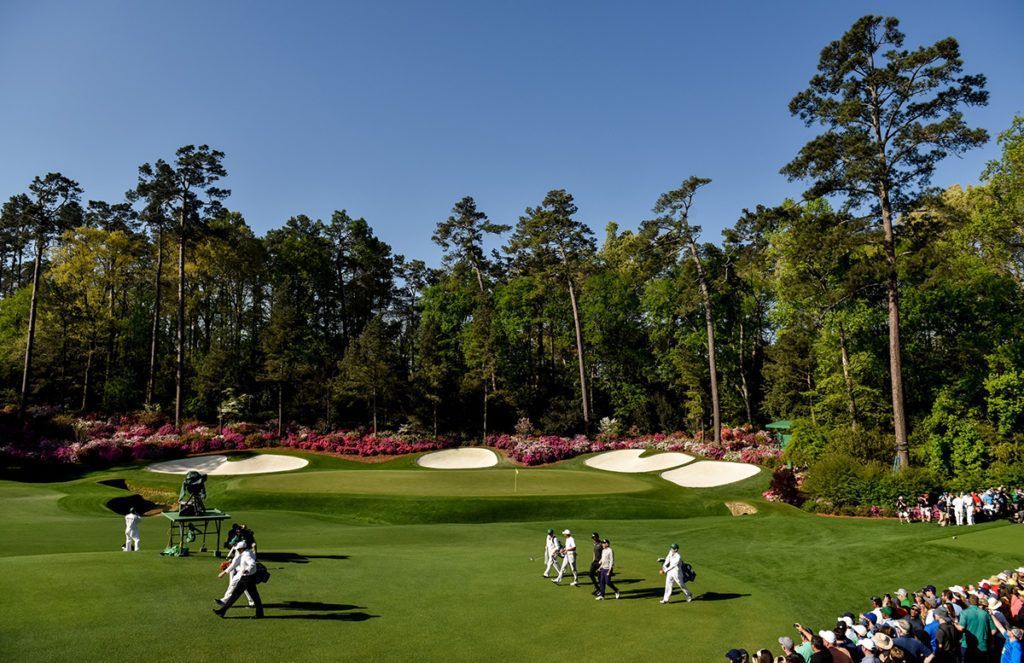 Crowds and players at the 2021 Masters Tournament at Augusta National Golf Club.