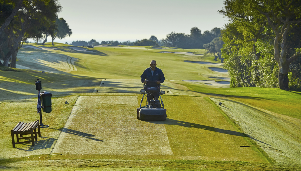 Aerial view of a professionally designed 18-hole golf course with pristine fairways and greens.