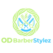 A logo featuring crossed scissors and a comb inside a light green circular vine, with 