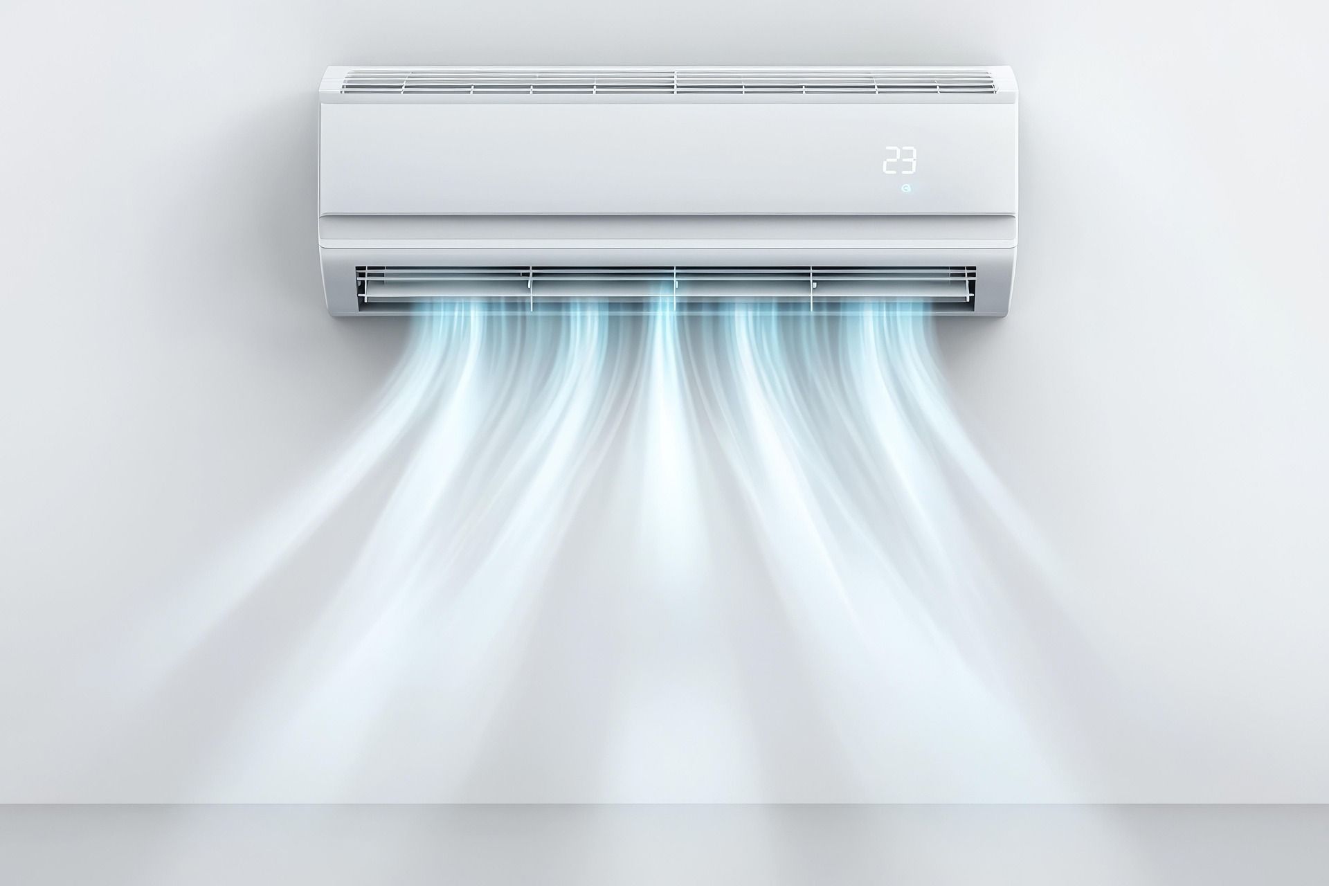 White wall-mounted air conditioner blowing cool air.