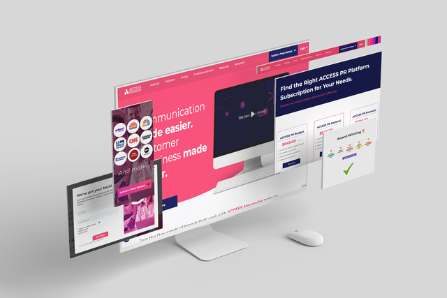 A computer monitor with a website on it is sitting on a desk next to a mouse.