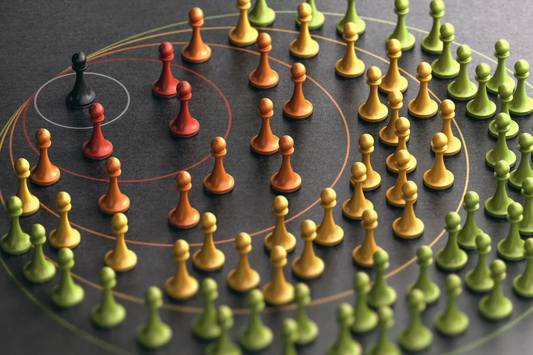 A group of chess pieces are arranged in a circle on a table.