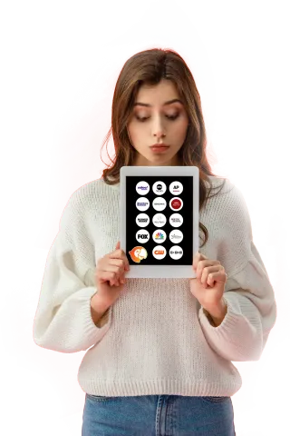 Woman holding tablet, looking at the screen with a surprised expression. White sweater, white background.