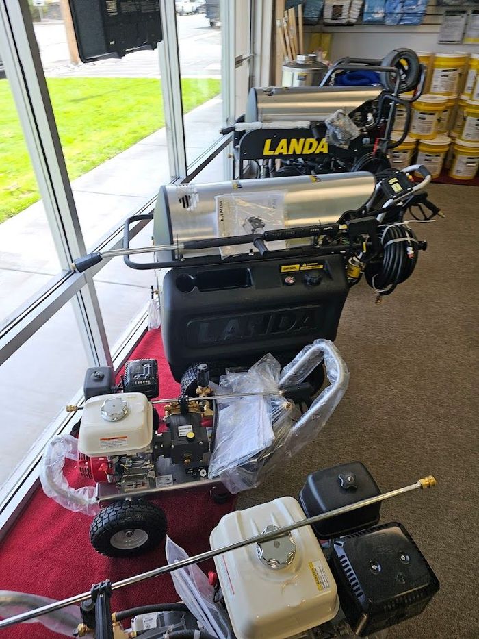 A display of pressure washers in a store.