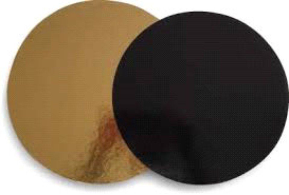 due fondi torta rotondi, uno dorato l'altro nero