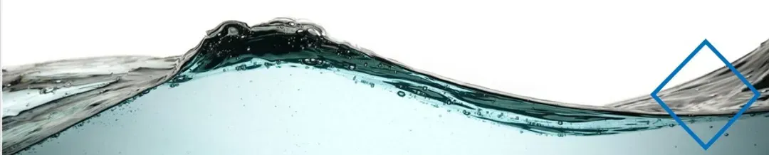 A close up of a wave of water on a white background.