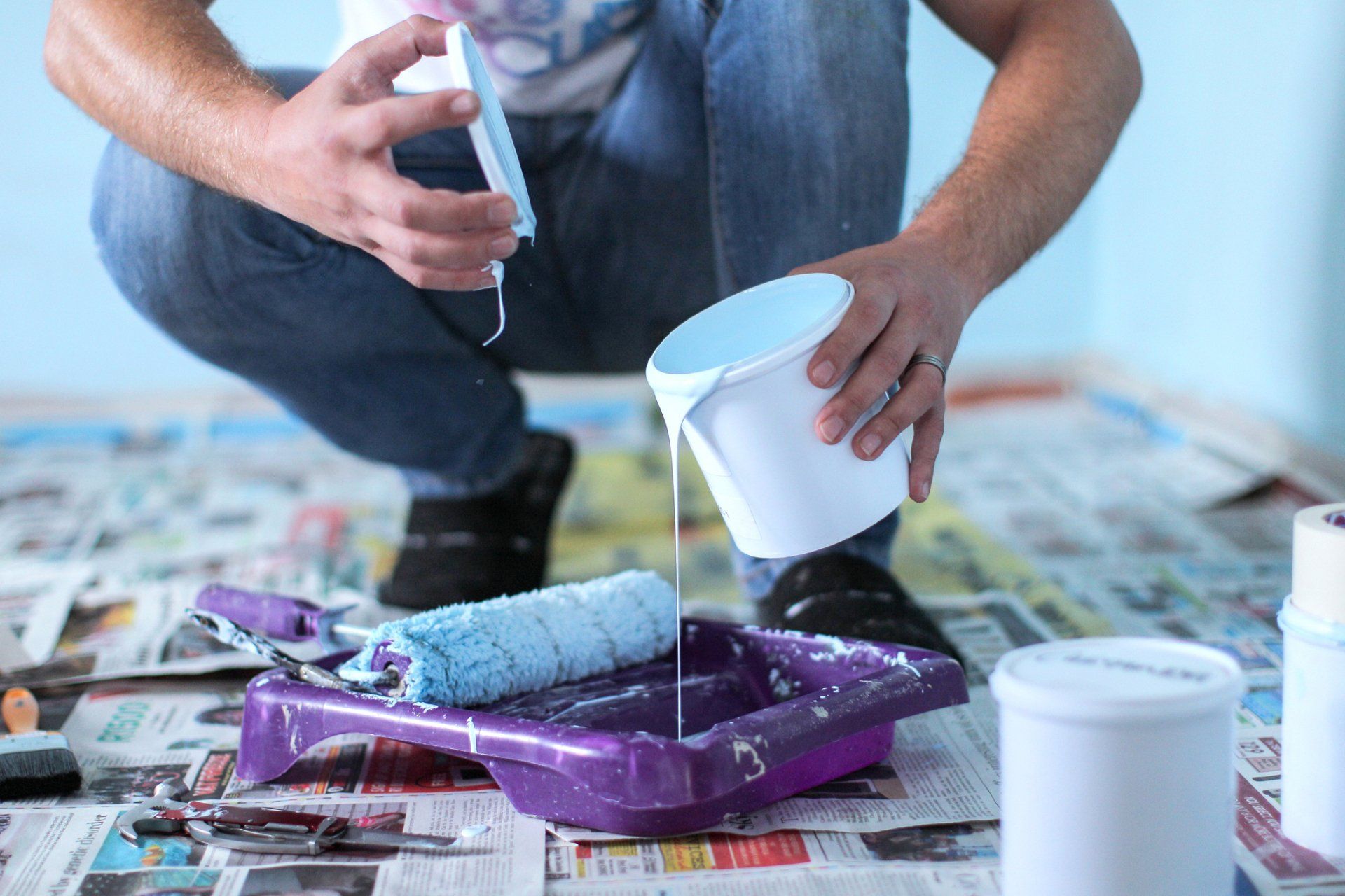 Man Filling Paint To Roller — Endicott, NY — Richard J. Woloszyn Painting