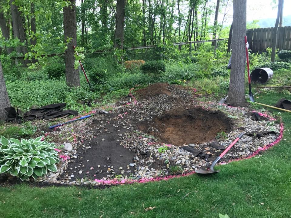 Pond Hardscape Before — South Bend, IN — New Generation Landscaping and Lawn
